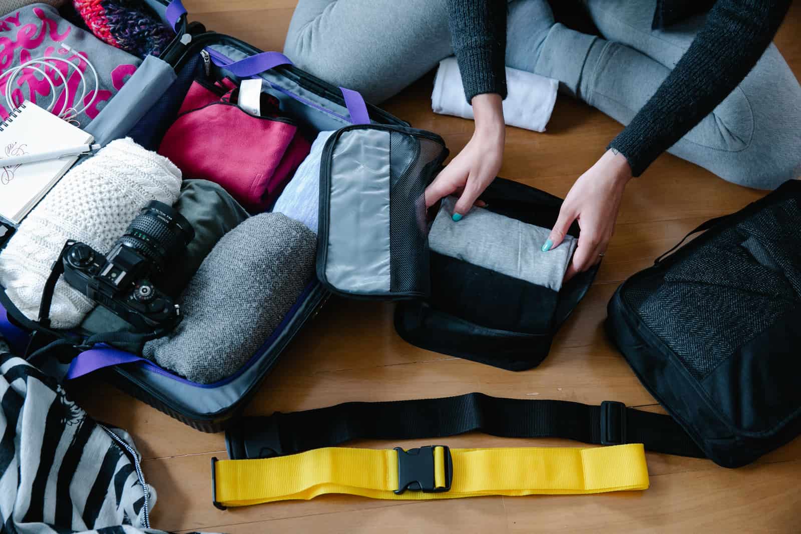 Rolled gear being packed away into bags