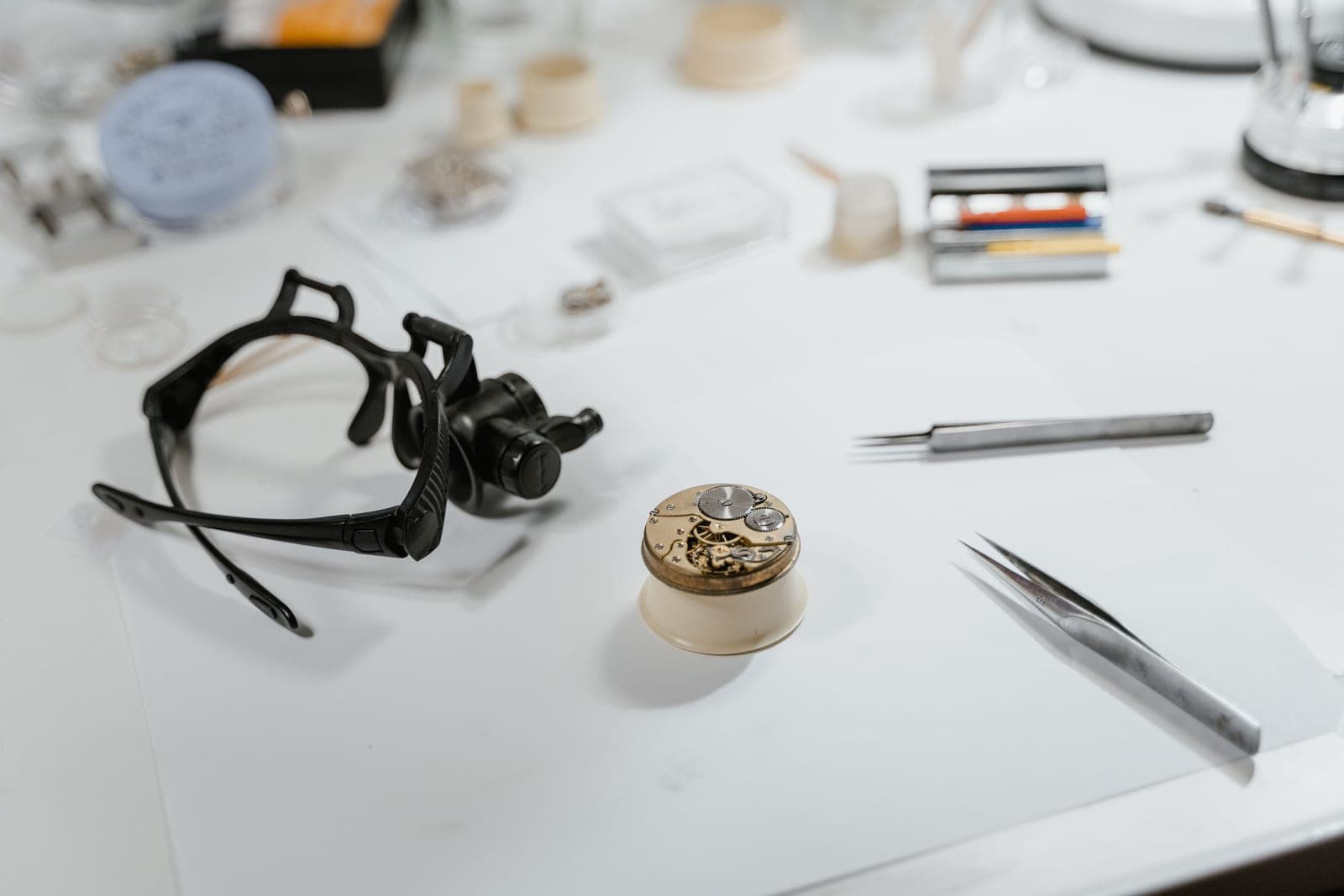 Small repair tools laid out on a work surface