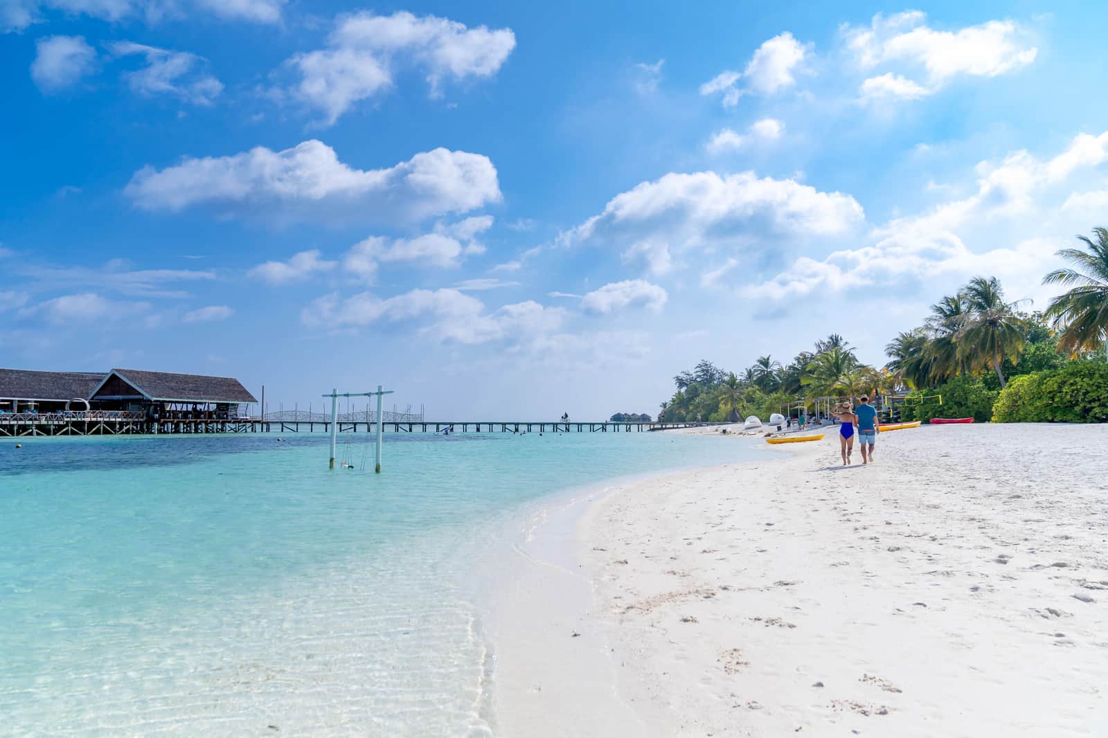Paddle boards on a bright beach